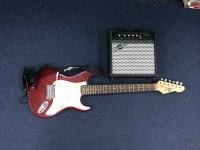 Lot 334 - ELECTRIC GUITAR along with an amplifier