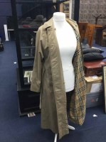 Lot 392 - BURBERRY TRENCH COAT along with another, a...