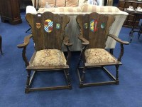 Lot 393 - PAIR OF OAK ARMCHAIRS with crests panels