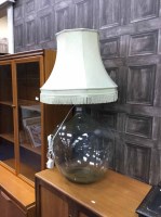 Lot 456 - LARGE GLASS CARBOY LAMP