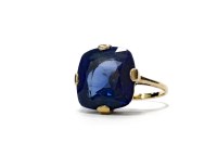 Lot 16 - CREATED SAPPHIRE DRESS RING set with a large...