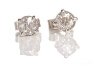 Lot 82 - PAIR OF DIAMOND STUD EARRINGS each set with a...