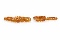 Lot 113 - TWO BUTTERSCOTCH AMBER BEAD NECKLACES the...