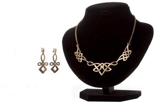 Lot 123 - NINE CARAT GOLD KNOTWORK NECKLET with three...