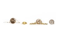 Lot 130 - NINE CARAT GOLD BROOCH with a central round...