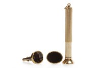 Lot 150 - PAIR OF ONYX SET CUFF LINKS each with an oval...