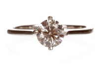 Lot 191 - DIAMOND SOLITAIRE RING set with a four claw...