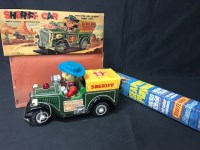 Lot 129 - TINPLATE BATTERY OPERATED SHERIFF CAR possibly...