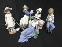Lot 207 - FOUR NAO FIGURES OF GIRLS along with another...