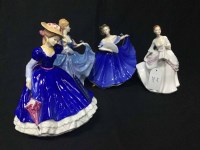 Lot 215 - FOUR ROYAL DOULTON FIGURES OF LADIES inlcuding...