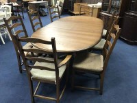 Lot 268 - ERCOL DINING TABLE AND EIGHT CHAIRS