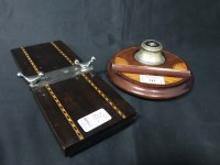 Lot 312 - EDWARDIAN INKSTAND AND A TIE PRESS
