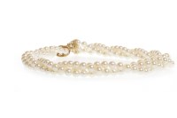 Lot 117 - THREE STRANDED PEARL NECKLACE each strand...