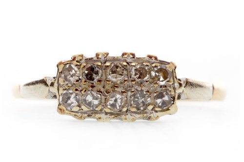 Lot 297 - A DIAMOND DRESS RING