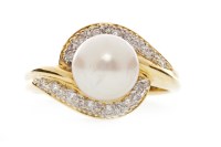 Lot 527 - DIAMOND AND PEARL DRESS RING set with a single...