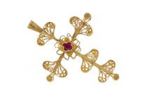 Lot 535 - RED GEM SET CROSS PENDANT in canetille work of...