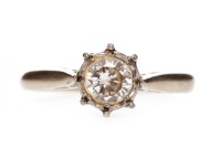 Lot 599 - DIAMOND SOLITAIRE RING with an illusion set...