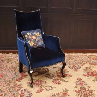 Lot 841 - EDWARDIAN UPHOLSTERED ARMCHAIR with concave...