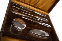 Lot 870 - GEORGE V SILVER MOUNTED CUTICLE SET maker...