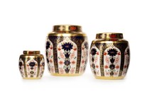 Lot 1296 - THREE GRADUATED ROYAL CROWN DERBY 'OLD IMARI' PATTERN GINGER JARS AND COVERS