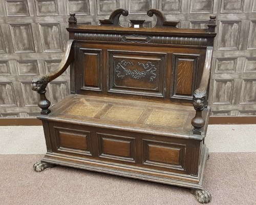 Lot 1631 - LATE VICTORIAN OAK HALL SETTLE the back with...