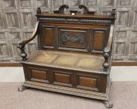 Lot 1631 - LATE VICTORIAN OAK HALL SETTLE the back with...