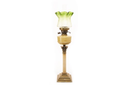 Lot 1639 - VICTORIAN OIL LAMP with green tinted glass...