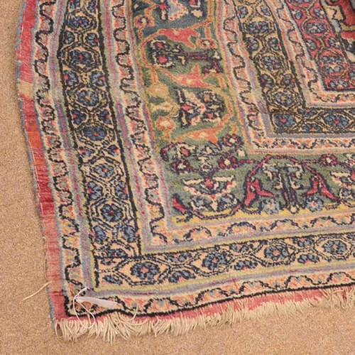 Lot 895 - CAUCASIAN BORDERED CARPET decorated with a...