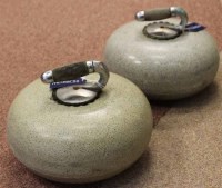 Lot 959 - TWO GREY GRANITE CURLING STONES both with...