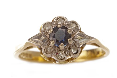 Lot 79 - A BLUE GEM AND DIAMOND CLUSTER RING
