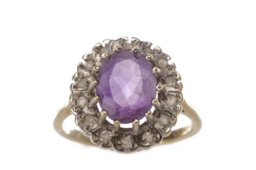 Lot 117 - A GEM AND DIAMOND CLUSTER RING