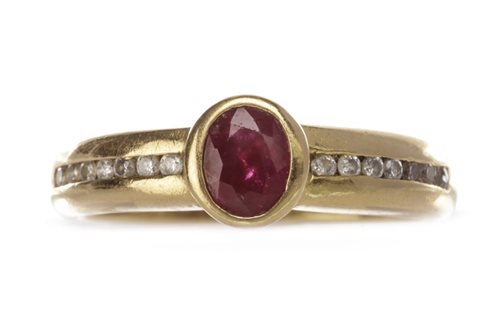 Lot 120 - A DIAMOND AND RED GEM SET RING