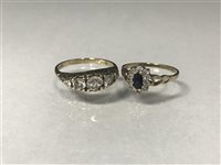 Lot 175 - A GEM SET FIVE STONE RING AND A CLUSTER RING