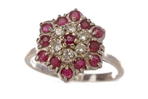 Lot 94 - A RED GEM AND DIAMOND CLUSTER RING