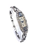 Lot 784 - A LADY'S PLATINUM AND DIAMOND COCKTAIL WATCH