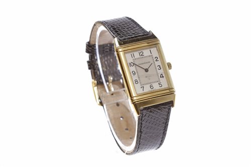 Lot 788 - A GENTLEMAN'S GOLD JAEGER LE COULTRE REVERSO WATCH