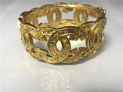Lot 14 - A GOLD PLATED CHANEL BANGLE