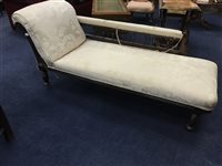 Lot 206 - A WHITE AND FLORAL UPHOLSTERED CHAISE LONGUE