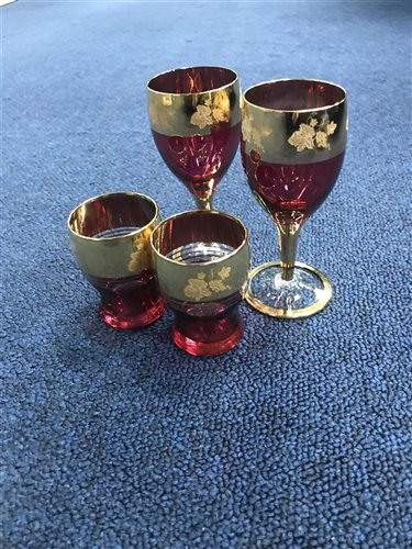 Lot 223 - A SET OF CRANBERRY GLASS LIQUEUR GLASSES AND OTHER GLASS