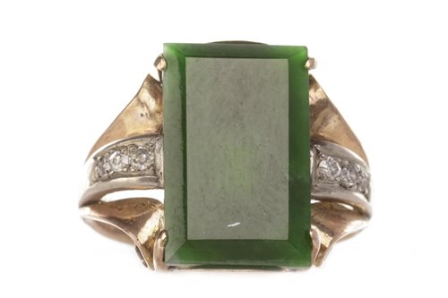 Lot 30 - A GREEN GEM AND DIAMOND RING