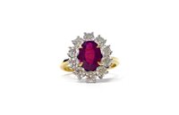 Lot 97 - AN IMPRESSIVE RUBY AND DIAMOND CLUSTER RING