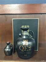 Lot 23 - QE2 FLAGON 12 YEARS OLD