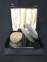 Lot 369 - A PAIR OF SILVER BACKED BRUSHES