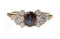 Lot 214 - A BLUE GEM AND DIAMOND RING