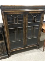 Lot 266 - A WALNUT DISPLAY CABINET AND ANOTHER