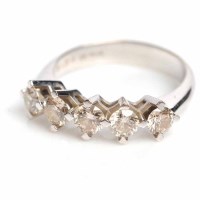 Lot 1629 - DIAMOND FIVE STONE RING set with five...