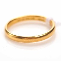 Lot 1631 - TWENTY-TWO CARAT GOLD WEDDING BAND with full...