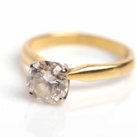 Lot 1636 - DIAMOND SOLITAIRE RING the brilliant cut...