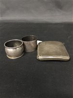 Lot 52 - A SILVER CIGARETTE CASE WITH TWO SILVER NAPKIN RINGS