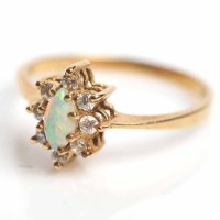 Lot 1645 - OPAL AND DIAMOND CLUSTER RING set with a...